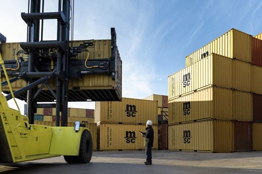 Employee supervising depot operations